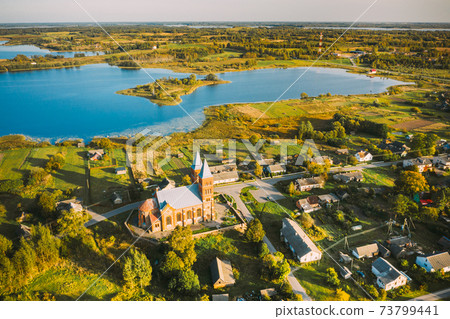 Ikazn, Braslaw District, Vitebsk Voblast, Belarus. Aerial View Of Church of the Body of God Ikazn, Braslaw District, Vitebsk Voblast, Belarus. Aerial View Of Church of the Body of God 73799441