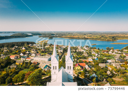Slobodka, Braslaw District, Vitebsk Voblast, Belarus. Aerial View Of Slobodka Village. Church of Divine Providence Slobodka, Braslaw District, Vitebsk Voblast, Belarus. Aerial View Of Slobodka Village. Church of Divine Providence 73799446