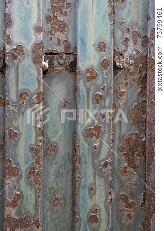 Badly rusty iron gate 73799461