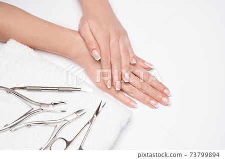 Top view of Tools of a manicure set on a white background 73799894