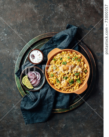 Pakistani chicken biryani rice, top view, vertical Pakistani chicken biryani rice, top view, vertical 73800357