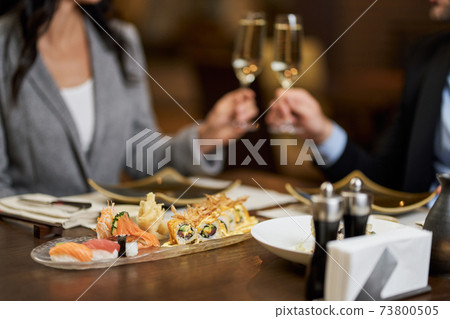 Brilliant date means dining with sushi and champagne Brilliant date means dining with sushi and champagne 73800505