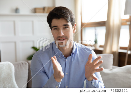 Head shot portrait confident man speaking at camera, video call Head shot portrait confident man speaking at camera, video call 73802331