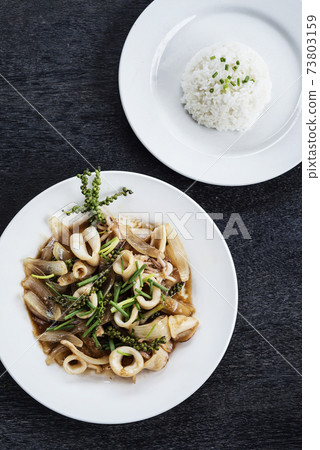fresh squid and kampot green pepper stir fry meal fresh squid and kampot green pepper stir fry meal 73803159