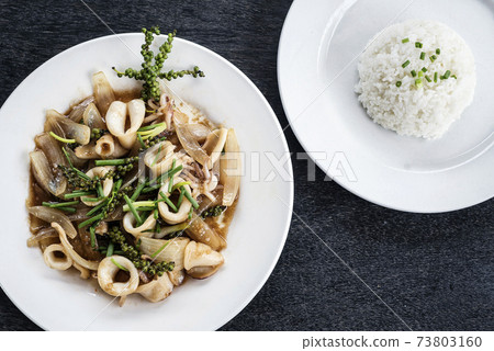 fresh squid and kampot green pepper stir fry meal 73803160