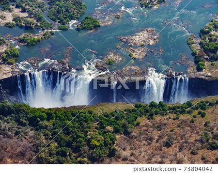 The world's three largest waterfalls seen from the sky Victoria Falls in Africa (dry season) The world's three largest waterfalls seen from the sky Victoria Falls in Africa (dry season) 73804042
