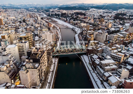 [Ishikawa Prefecture] Saikawa Bridge and Kanazawa Cityscape / Townscape "Bridge, Town and Mountain" Aerial view 73806263