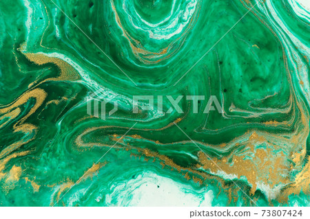 Green marble abstract acrylic background. Marbling artwork texture. Agate ripple pattern. Gold powder. 73807424