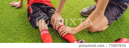BANNER, LONG FORMAT Little cute kid boy in red football uniform and his trainer or father playing soccer, football on field, outdoors. Active child making sports with kids or father, Smiling happy boy BANNER, LONG FORMAT Little cute kid boy in red football uniform and his trainer or father playing soccer, football on field, outdoors. Active child making sports with kids or father, Smiling happy boy 73807656