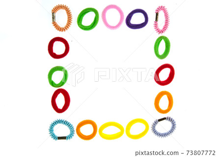 Colorful hair elastic frame isolated on white background 73807772