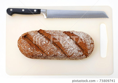 Bread and knife 73809741