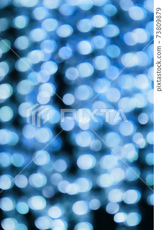 Flickering pink and blue blurred lights of Christmas background 73809879