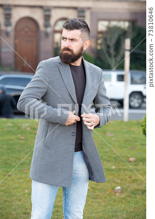 brutal mature bearded man with moustache walking  73810646