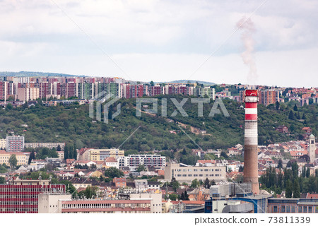 Panorama of Brno. Multi-storey areas and a huge pipe CHP. Soviet houses on a hill. Panorama of Brno. Multi-storey areas and a huge pipe CHP. Soviet houses on a hill. 73811339