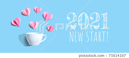 2021 New Start message with a coffee cup and paper hearts 73814107