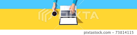 Person using a laptop computer Person using a laptop computer 73814115