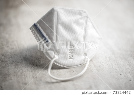 KN95 face mask. FFP2 mask as covid-19 protection. Coronavirus mask. 73814442