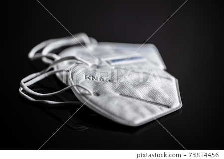 KN95 face mask. FFP2 mask as covid-19 protection. Coronavirus mask. 73814456