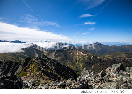 《Northern Alps》 Mt. Kasagatake and Mt. Kurobegoro seen from the summit of Mt. Suisho 73815094