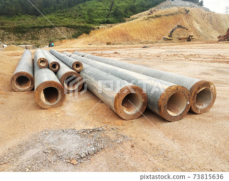 IPOH, MALAYSIA -MARCH 03, 2020:  Bore pile materials made from strong precast concrete designed by the engineers. It will be driven into the soil as the foundation and will be tied by pile caps. 73815636