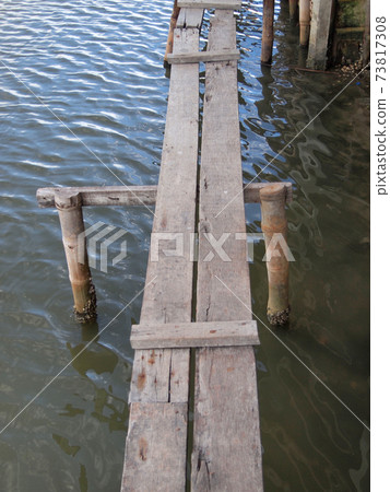 thin foot bridge across the river thin foot bridge across the river 73817308
