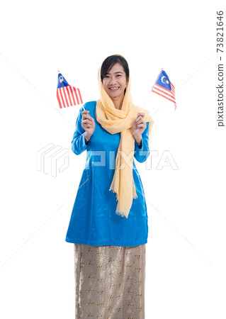 muslim woman excited holding flag of malaysia muslim woman excited holding flag of malaysia 73821646