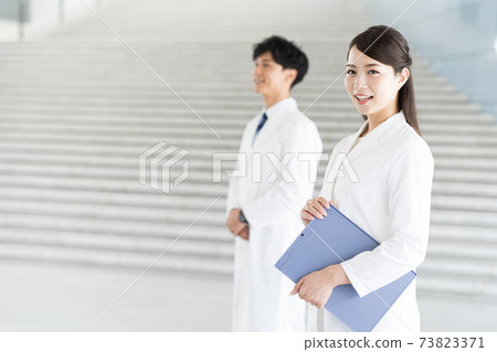 Young pharmacist working in a hospital Young pharmacist working in a hospital 73823371