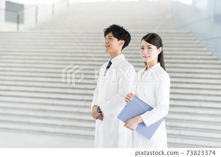 Young pharmacist working in a hospital Young pharmacist working in a hospital 73823374