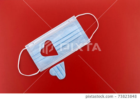 Face mask with a cut-out heart shape 73823848