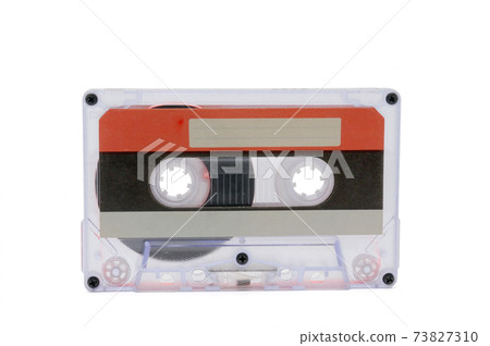 Compact audio tapes for magnetic recording on a white background.Compact cassettte Compact audio tapes for magnetic recording on a white background.Compact cassettte 73827310