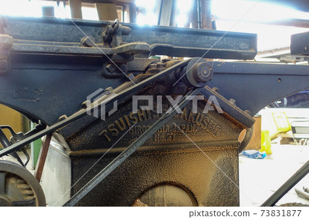 Old woodworking machine 73831877