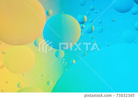 Blue and yellow abstract background picture made with oil, water and soap Blue and yellow abstract background picture made with oil, water and soap 73832385