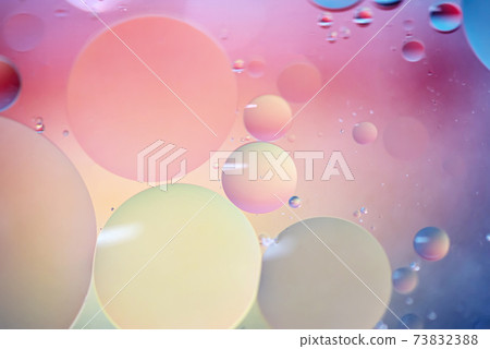 Orange and blue abstract background picture made with oil, water and soap Orange and blue abstract background picture made with oil, water and soap 73832388