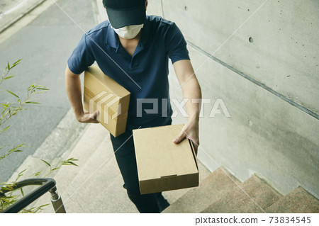 Delivery courier cardboard uniform stairs Delivery courier cardboard uniform stairs 73834545