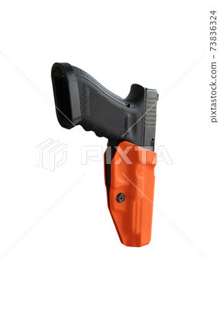 gun pistol in orange envelope isolated on white gun pistol in orange envelope isolated on white 73836324