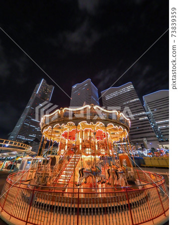 Merry-go-round at night 73839359