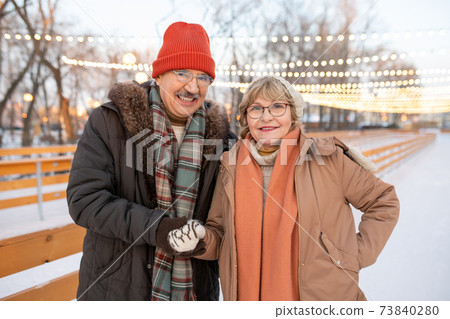Couple walking in the park Couple walking in the park 73840280