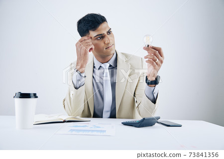 Pensive entrepreneur 73841356