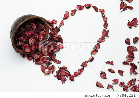 Heart made from red rose petals for Valentine's day Heart made from red rose petals for Valentine's day 73842221