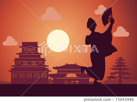 Japanese girl in national costume called Kimono stand in front castle 73843946