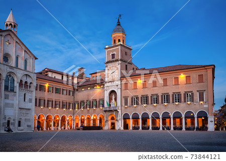 building of Town Hall at dusk in Modena, Italy 73844121
