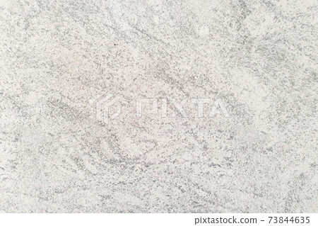 Abstract weathered texture stained old stucco light gray and aged paint white brick wall background in rural room. 73844635