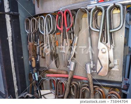 Set of glass cutters and scissors for shaping hot glass on glassblower pipe. Set of glass cutters and scissors for shaping hot glass on glassblower pipe. 73844704