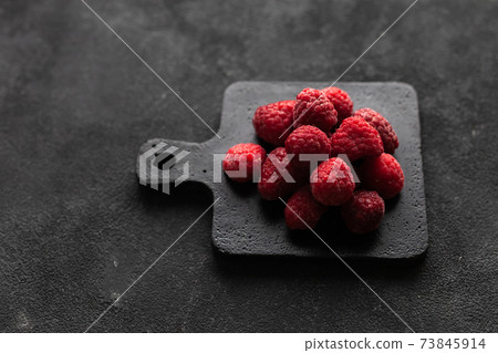 Frozen fresh ripe bright red raspberries Frozen fresh ripe bright red raspberries 73845914
