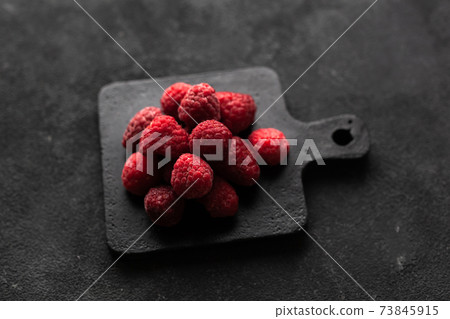Frozen fresh ripe bright red raspberries Frozen fresh ripe bright red raspberries 73845915