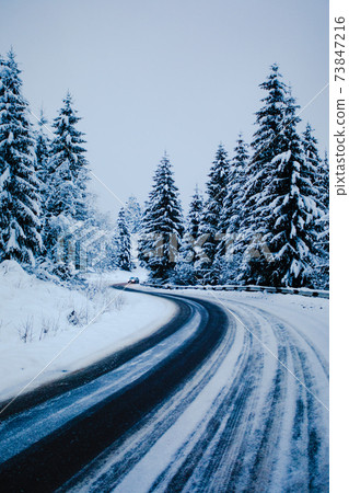 Driving home safely after long-lasting snow storm Driving home safely after long-lasting snow storm 73847216