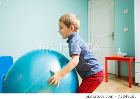 Little child trying out his physical abilities Little child trying out his physical abilities 73848163