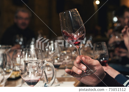 people consider the color of the wine and try how it smells in different glasses people consider the color of the wine and try how it smells in different glasses 73851512