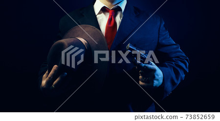 Gangster man in suit. Gangster man in suit. 73852659