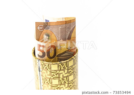 Metal piggy bank with Euro symbols for saving money. On a white background with euro banknotes  73853494